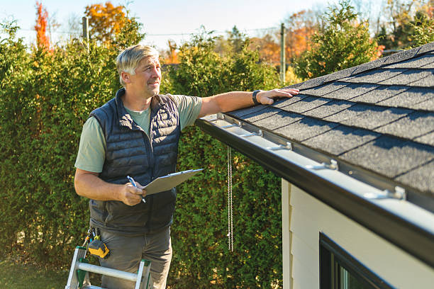 Professional Roof Repair technician working in Armington, IL